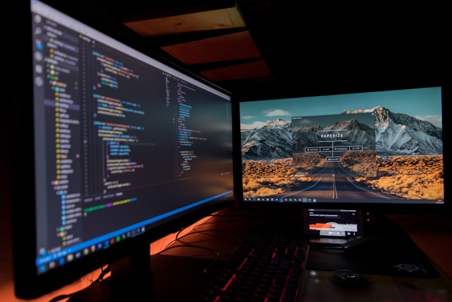 temp image: Image of code on one screen, website on an another by Fotis Fotopoulos from unsplash.com